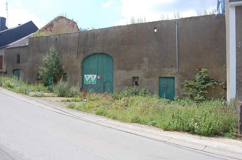 Transformation d'une ferme en une maison + 2 appartements